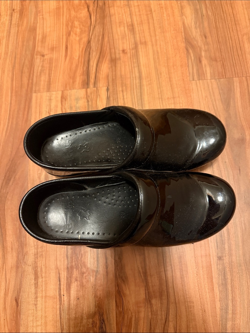 Dansko Women's Black Patent Leather Slip-On Clogs